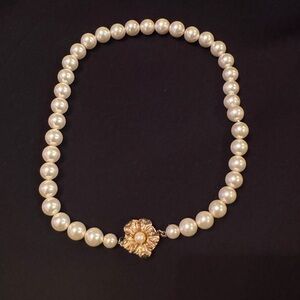 Elegant Pearl Necklace with Gold Flower Clasp